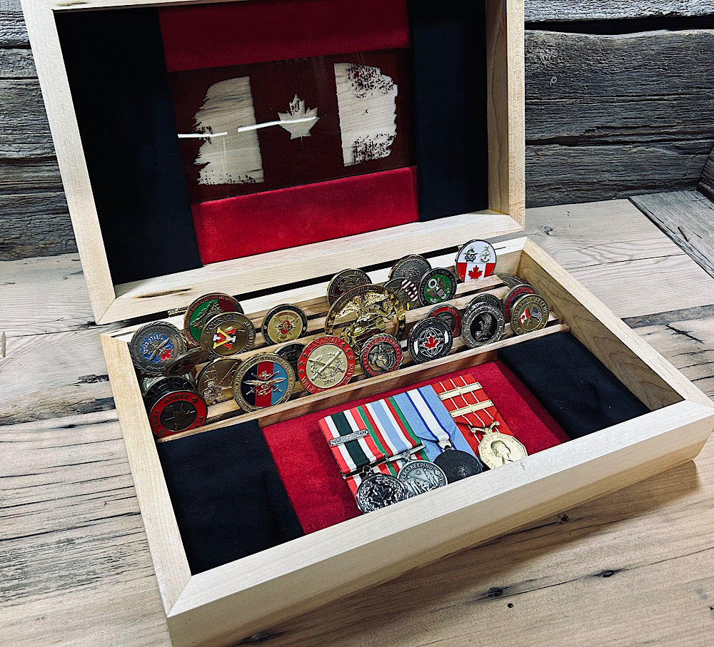 Custom flag display boxes showcasing medals and military insignia in a beautifully crafted wooden box.