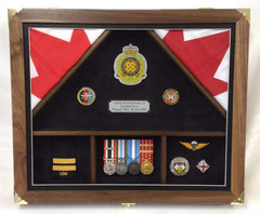 Custom engraved plaque commemorating military achievements with flags and medals.