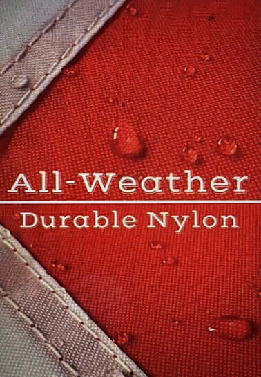 Close-up of red durable nylon fabric with water droplets, showcasing all-weather suitability.